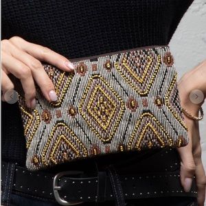 Handmade patterned clutch.
